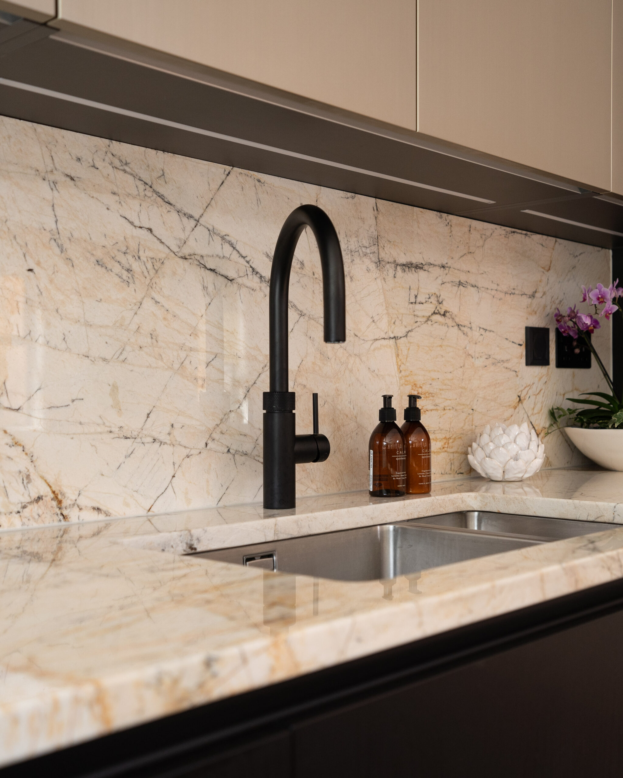 PGK Contemporary Illuminated Dark Stone Kitchen Island PGK Contemporary Illuminated Dark Stone Kitchen Island with Taupe Cabinets, London